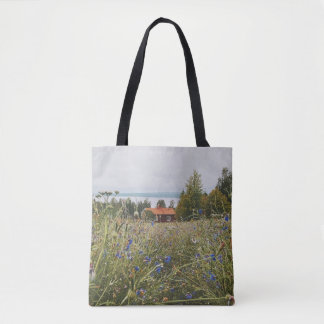 Scandi cottage by the lake tote bag