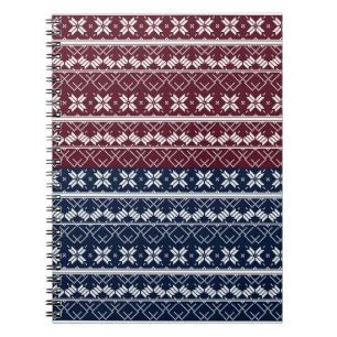 Scandinavian ornament on a blue, burgundy notebook