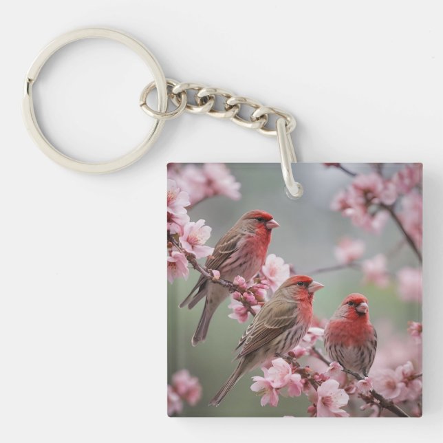 "Scarlet Trio: Red Finches Among Pink Blossoms" Key Ring (Front)