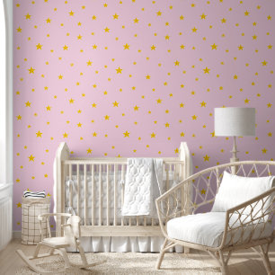 Scattered Golden Yellow Stars on Light Pink Wallpaper