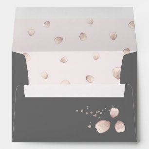 scattering pink petals dark grey wedding envelope