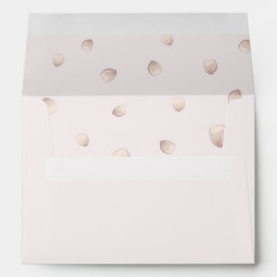 scattering pink petals soft pink wedding envelope
