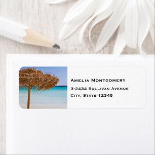 Scenic Tropical Beach with Straw Umbrella Address