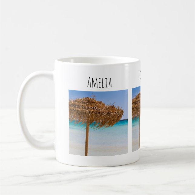 Scenic Tropical Beach with Straw Umbrella Coffee Mug (Left)