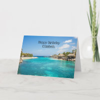 Scenic Tropical Beach with Thatched Huts Photo