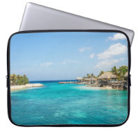 Scenic Tropical Beach with Thatched Huts Photo