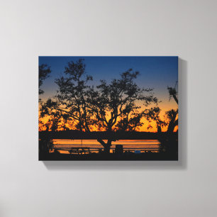 Scenic view of the sunset over the river canvas print