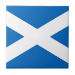 Scotland Flag Tile<br><div class="desc">National flag of Scotland The Scottish flag consists of a white cross, or saltire, against a blue background. It is also known as St. Andrew's Cross, or simply the Saltire. The flag has been in use since the 16th century, and is the world's oldest sovereign flag. Note that any distortion...</div>