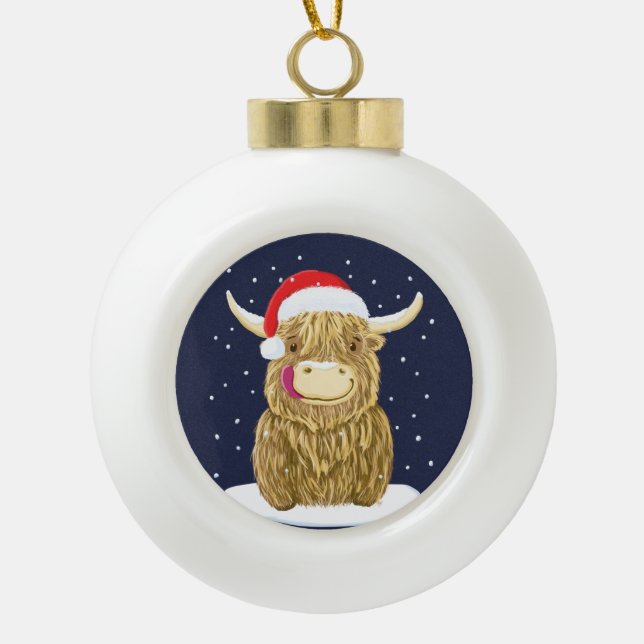 Scottish Highland Cow In The Christmas Snow Ceramic Ball Christmas Ornament (Front)