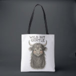 ⛰️ Scottish Highland Cow:Wild Heart, Gentle Soul  Tote Bag<br><div class="desc">Add a touch of charming rustic elegance to your life with this adorable Highland Cow design! Featuring a detailed, vintage-style pencil sketch of a beloved shaggy 'coo' with cute blushing cheeks and a gentle smile. The distressed typography above reads 'WILD BUT GENTLE', capturing the perfect duality of these majestic creatures....</div>