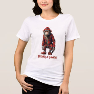 scottish monkey in disguise - nothing in common Tri-Blend shirt