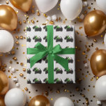 Scotty Dog and Tartan Merry Christmas Wrapping Paper<br><div class="desc">Wrap you gift in this adorable Scottish Terrier gift wrap. Matching tissue and gift tags also available.</div>