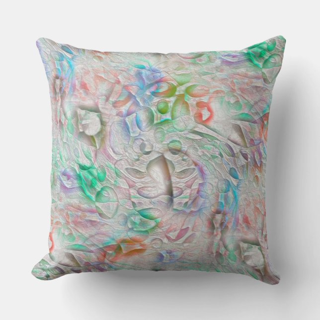 Scratched pixels in coloured texture over off-whit cushion (Front)