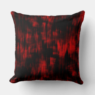 Scratched spots in bright red and black            cushion