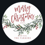 Script Merry Christmas Greenery  Classic Round Sticker<br><div class="desc">A festive,  red,  green and white merry Christmas gift sticker,  favour sticker or envelope enclosure featuring bold script and watercolor greenery with leaves and berries.</div>
