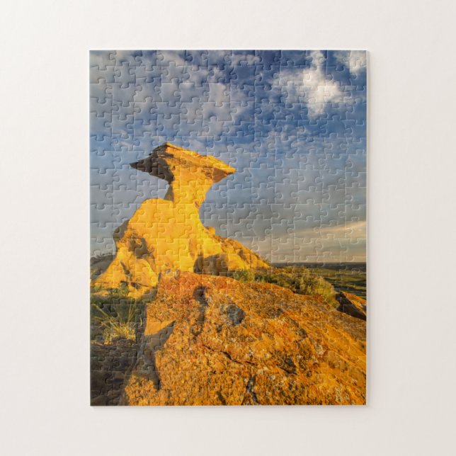 Sculpted Badlands Formation In Short Grass Jigsaw Puzzle (Vertical)