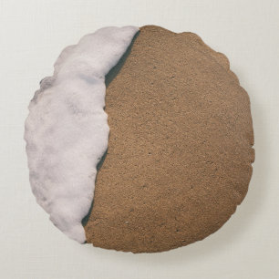 Sea foam on sand round cushion