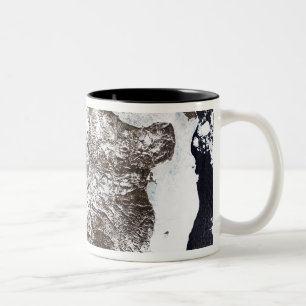Sea ice lines the shoreline in eastern Greenlan Two-Tone Coffee Mug