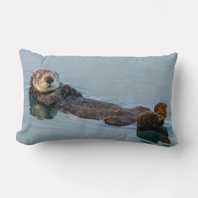Sea otter floating on back in ocean lumbar cushion (Front)