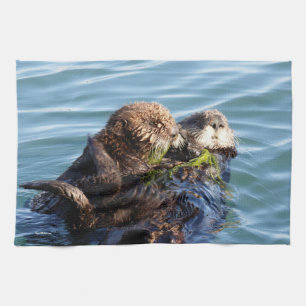 Sea Otter mother and pup with kelp Tea Towel
