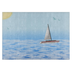 Sea scene with boat cutting board