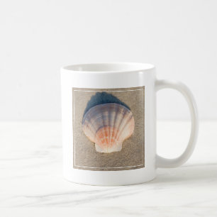 Sea Shell Laying On Sandy Beach Coffee Mug