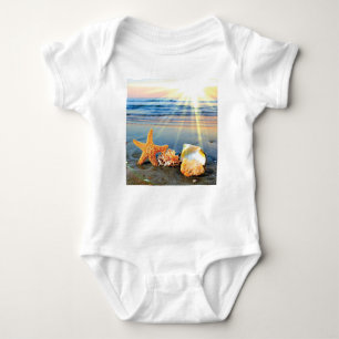 Sea shells and starfish on beach baby bodysuit