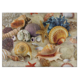 Sea shells on beach cutting board
