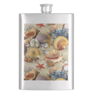 Sea shells on beach hip flask