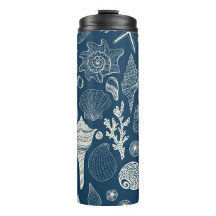 Sea shells on dark blue thermal tumbler