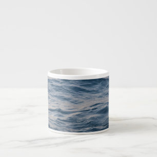 Sea water closeup espresso cup