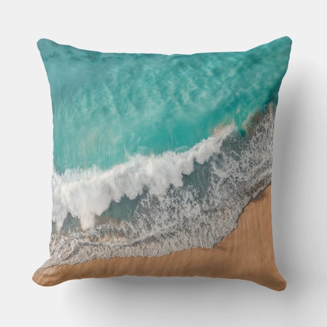 Sea waves wash over the sandy beach cushion (Front)