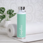 Seafoam Personalised Wedding Bridesmaid Water Bottle<br><div class="desc">Gift your wedding bridesmaid with this trendy,  vacuum Insulated water bottle that features her name in white,  stylised script on a seafoam colour background designed to match your wedding colour scheme. Personalise bottle by editing and replacing name with your own as desired. Select your water bottle style.</div>