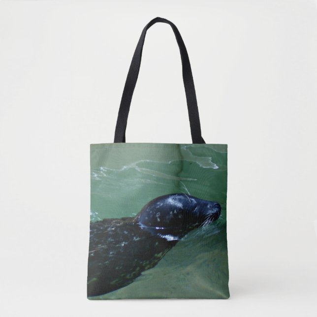 Seal Gliding Through Calm Water Tote Bag (Front)