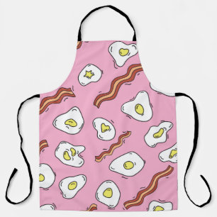 Seamless breakfast pattern with fried eggs and bac apron