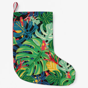 Seamless graphic pattern with leaves monstera and small christmas stocking
