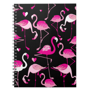 Seamless pattern from pink flamingos on a dark bac notebook