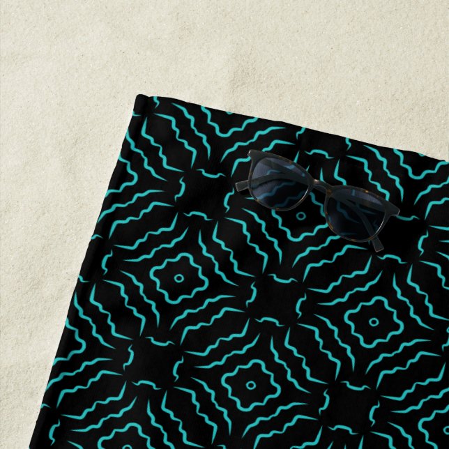 Seamless Pattern In Bright Turquoise On Black Beach Towel (In Situ)