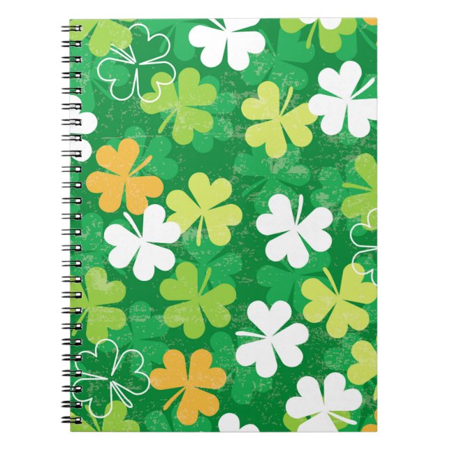 Seamless pattern of scattered clovers and shamrock notebook (Front)