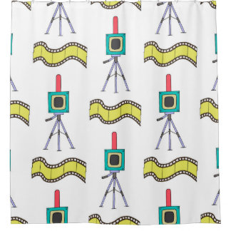Seamless pattern with cameras and film strips on a shower curtain