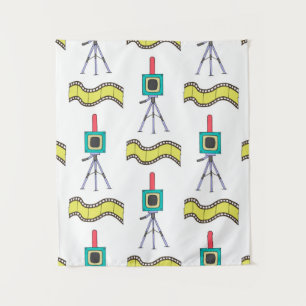 Seamless pattern with cameras and film strips on a tapestry