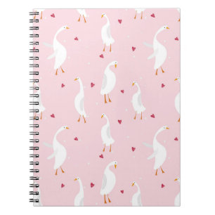 Seamless pattern with cute duck with heart on pink notebook