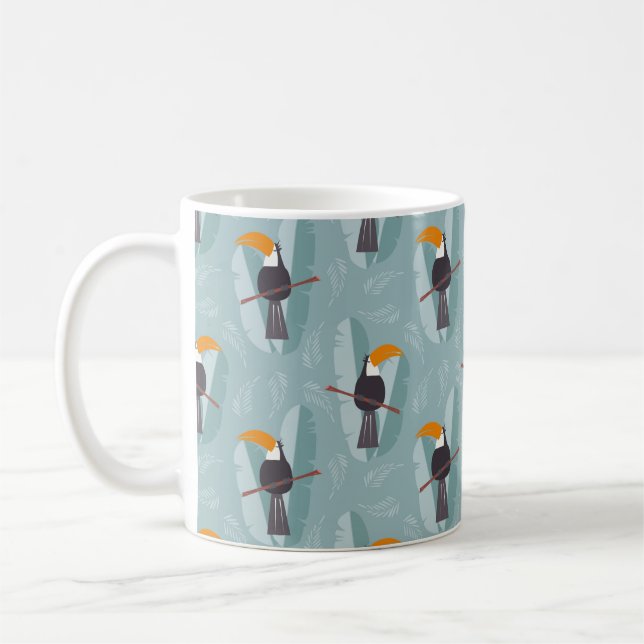 Seamless pattern with cute jungle parrot toucan on coffee mug (Left)