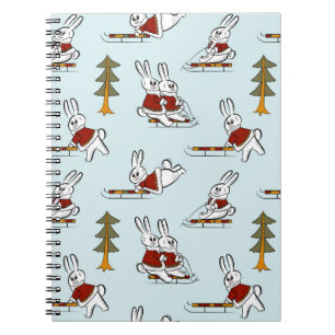 Seamless pattern with different rabbits on sleds i notebook