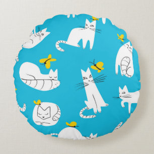 Seamless pattern with funny cats playing with butt round cushion