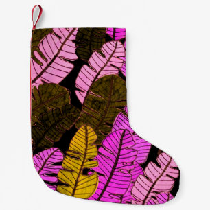 Seamless pattern with hand drawn tropical leaves. small christmas stocking
