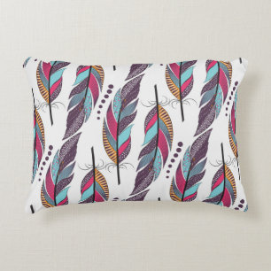 Seamless pattern with large colored feathers and d decorative cushion