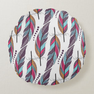 Seamless pattern with large colored feathers and d round cushion