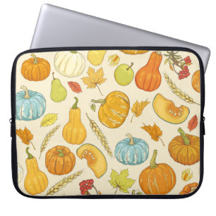 Seamless pattern with pumpkins, autumn leaves, app laptop sleeve