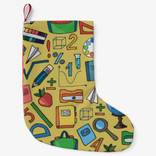 Seamless pattern with school supplies on a yellow  small christmas stocking